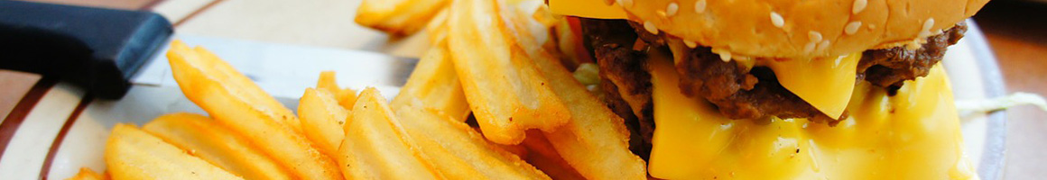 Eating Burger at Bonanza Drive-Up restaurant in Cottage Grove, OR.